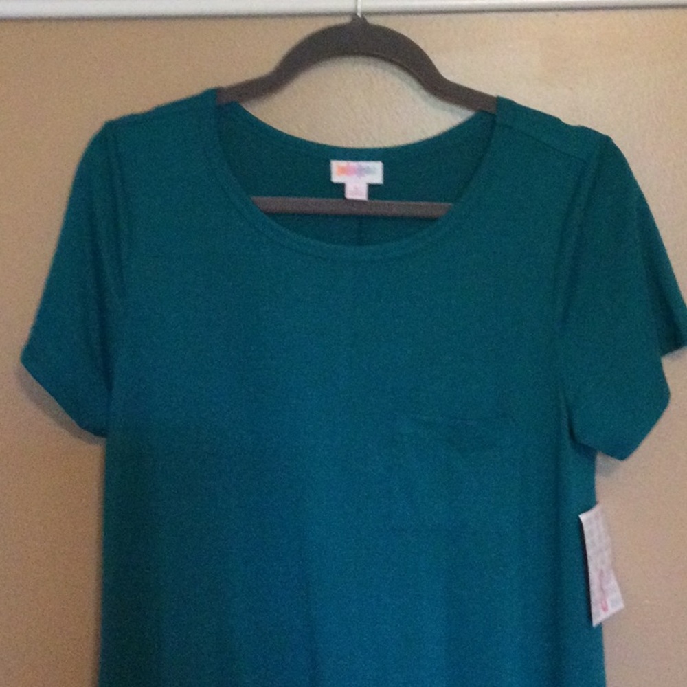 New with tags Lularoe Carly Dress, size Small. Solid Jade Green